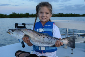 catching big speckled trout in mosquito lagoon
