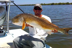 nate with 35 pound redfish in oak hill florida