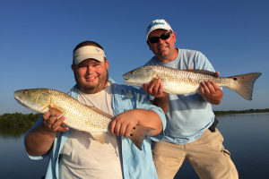redfish doubled up catch in mosquito lagoon