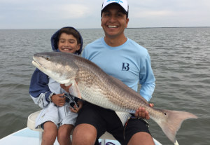 bull red fishing mosquito lagoon summer